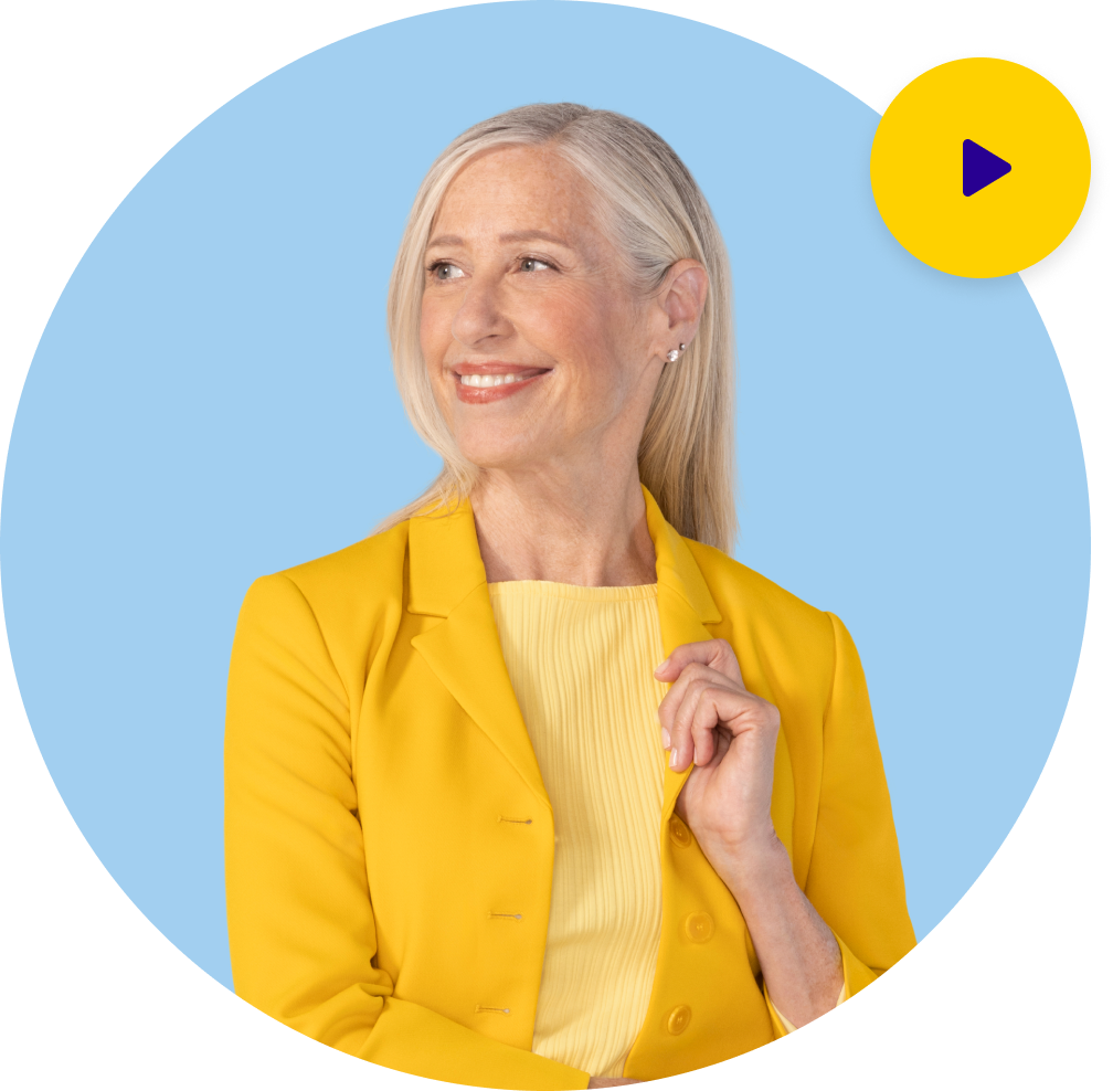 A woman smiling looking to the side with a play button in the top right corner