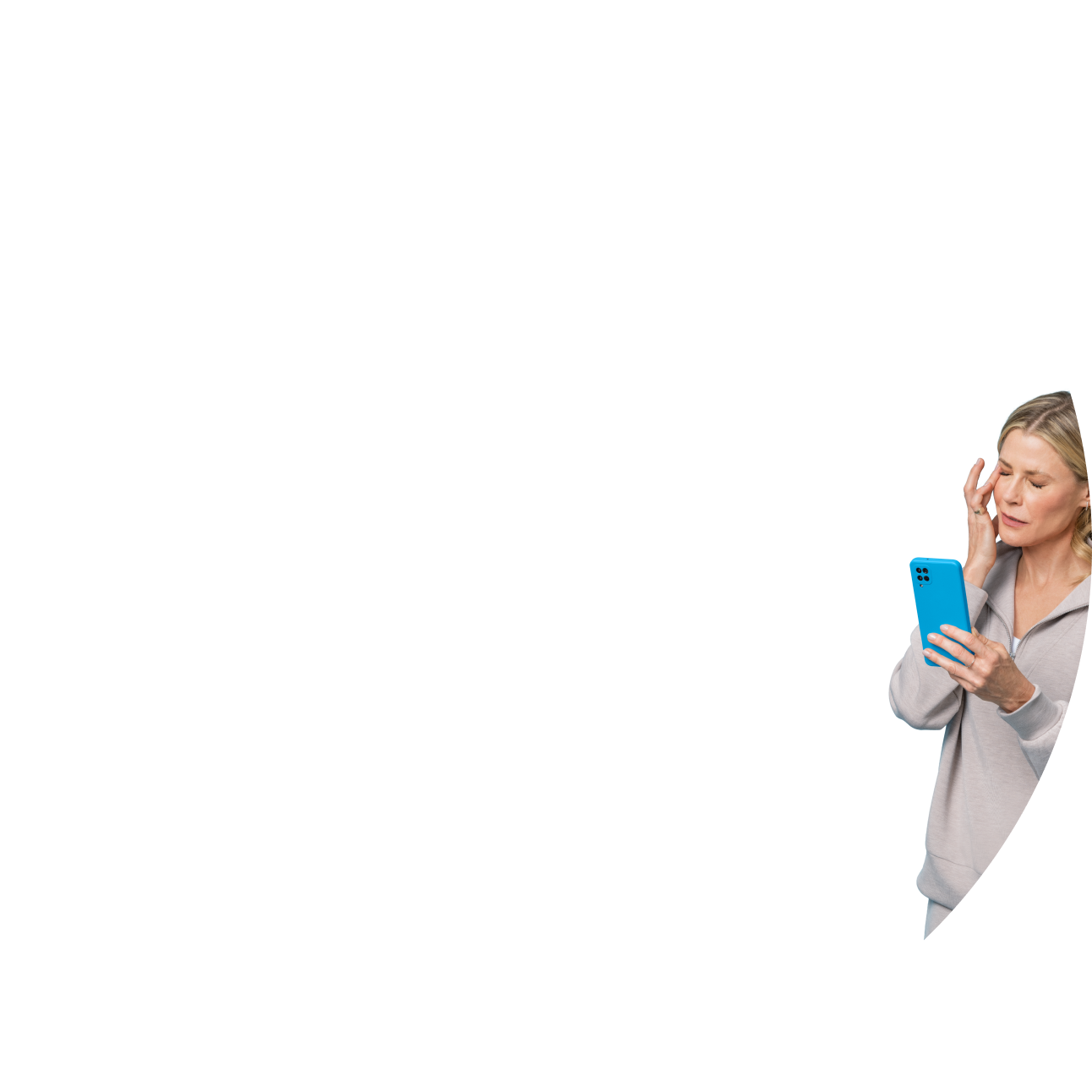 Julie Bowen looking at her phone and rubbing her eyes